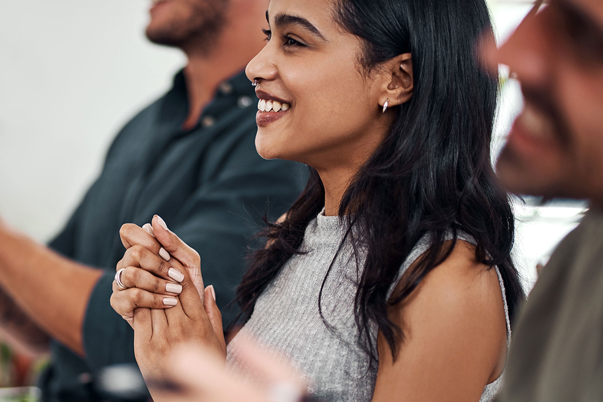 Image of smiling woman at a conference