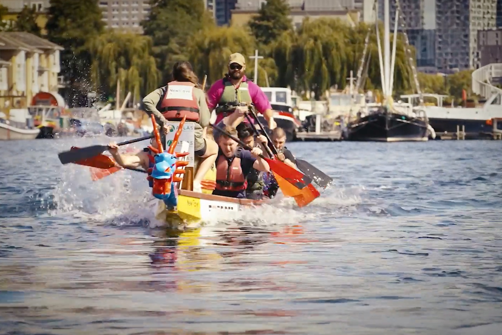 Picture of people racing on a boat